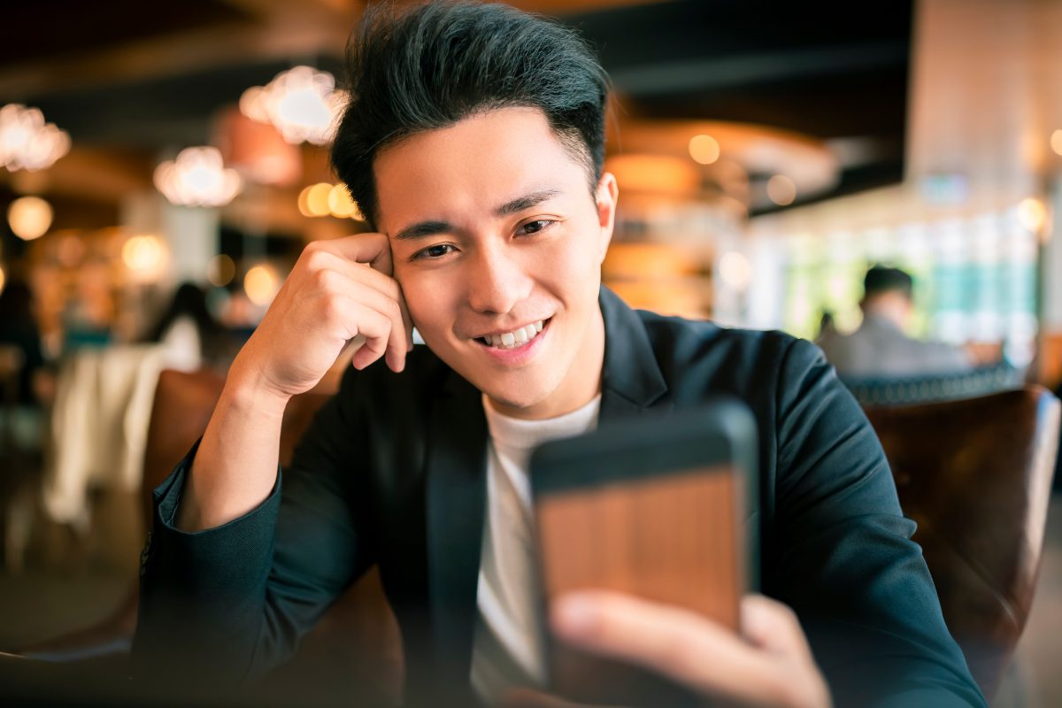 Young Business Man Working,On Laptop And Mobile Phone